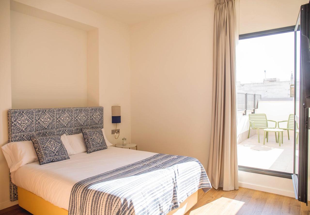 Nqn Aparts & Suites Sevilla Bagian luar foto