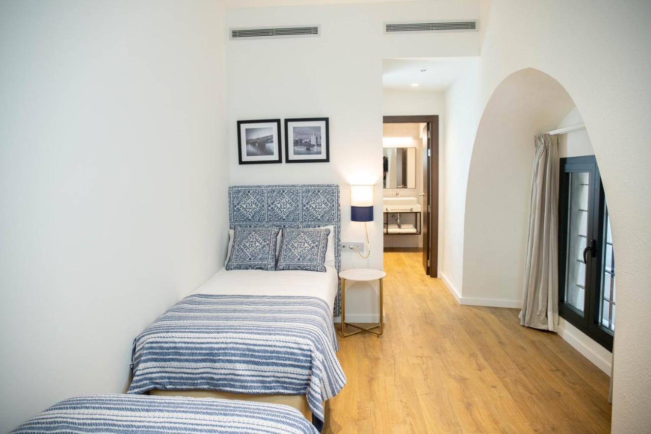 Nqn Aparts & Suites Sevilla Bagian luar foto